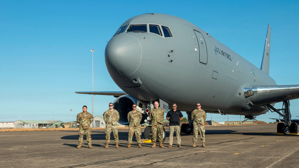 Boeing KC-46 field service representative Ed Musterer (second from right) poses with U.S. Air Force maintenance leaders in front of a KC-46A Pegasus tanker from McConnell Air Force Base at RAAF Base Darwin in the Northern Territory, Australia. (TSgt Heather Clements / U.S. Air Force photo)