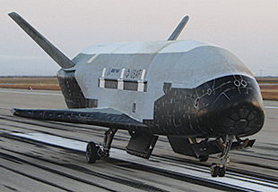 Picture of X-37B re-entry space craft.