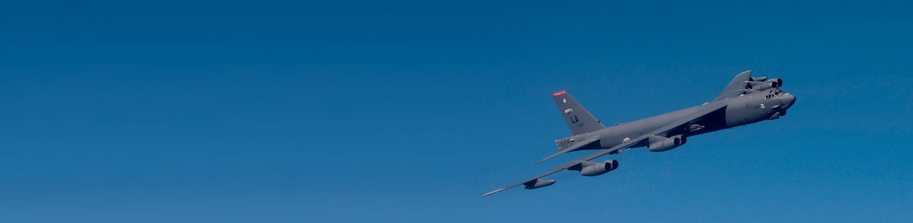 B-52 in flight in a clear blue sky