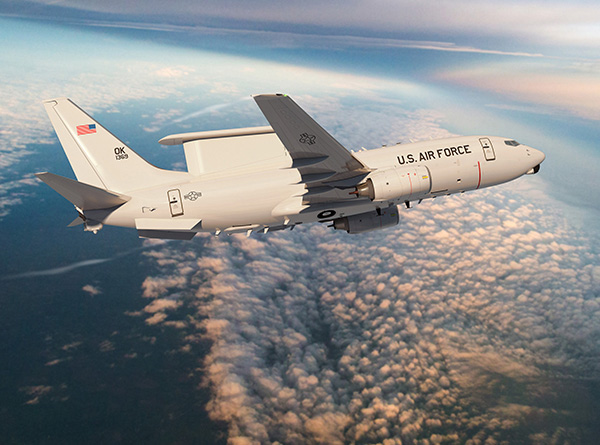 E-7A flying above clouds