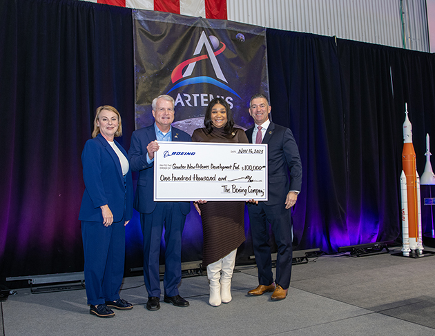 Senior leadership from Boeing shown presenting a $100,000 Boeing grant to the Greater New Orleans Development Foundation of GNO, Inc. From left to right, Tina Watts (Boeing), Dave Dutcher (Boeing), Daphine Barnes (GNO Inc.) and Michael Hecht (GNO Inc.) 