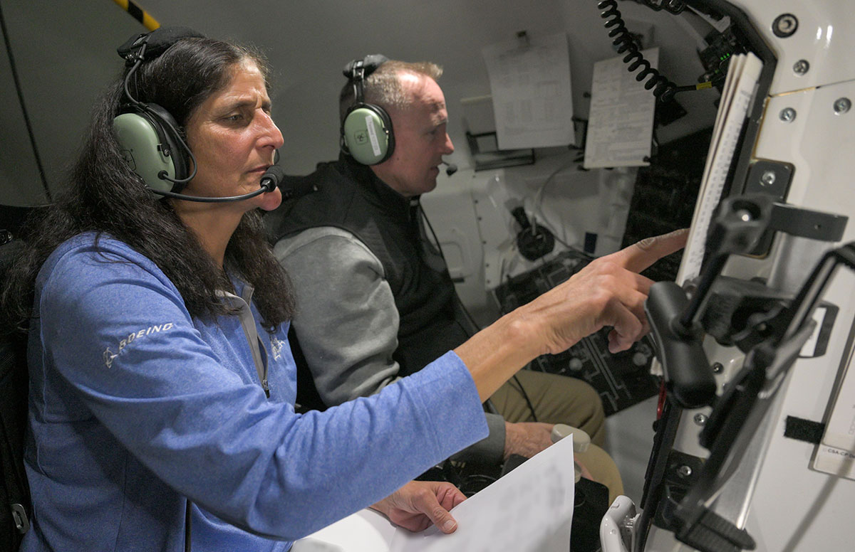 NASA astronauts Suni Williams (foreground) and Butch Wilmore during an Undock to Landing Mission Dress Rehearsal on Jan. 18 in the Boeing Mission Simulator in Houston.