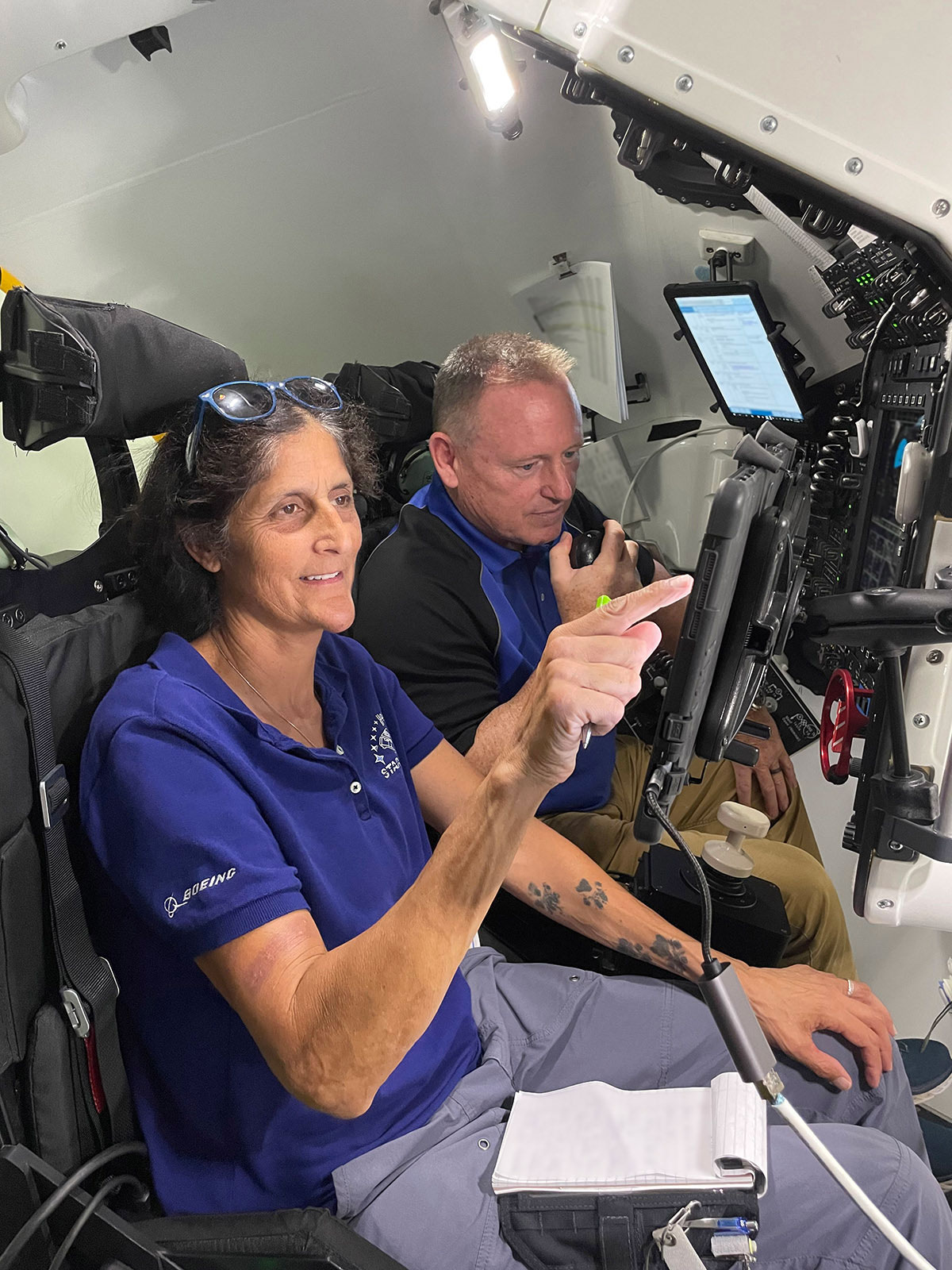 NASA astronauts Suni Williams and Butch Wilmore in the Boeing Mission Simulator in Houston.