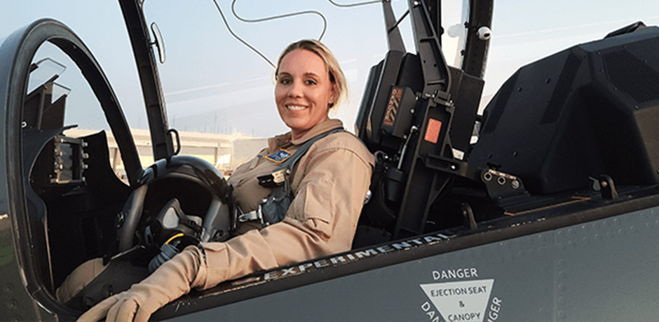 Caroline Jensen in the cockpit of a jet